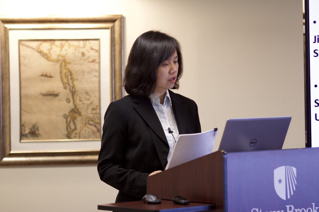Ms. Qian Xu lecturing