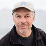 Conservationist and writer Carl Safina in the northwest coast of Svalbard. Dr. Safina was invited to sail with Greenpeace to bear witness to the changing climate in the Arctic and the impacts of industrial fishing on the marine environment.