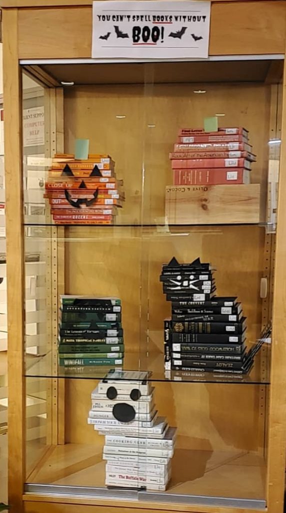 Halloween figures made out of stacked books