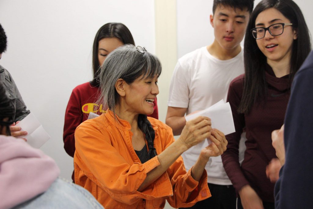 Prof. Nagasawa holding paper