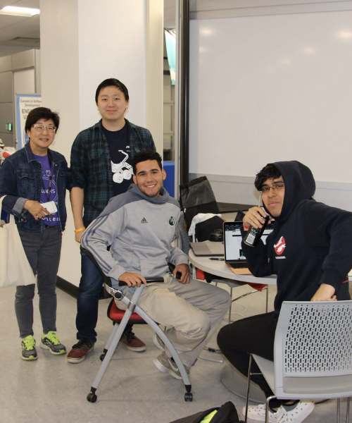 Students working at hackathon