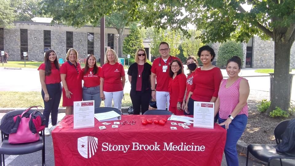 Healthy Libraries Program staff tabling outside