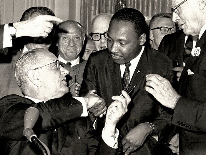 Signing of Civil Rights Act of 1964. Pictured center, Martin Luther King; center left, Senator Jacob K. Javits.  From the Senator Jacob K. Javits Collection. Special Collections, SBU Libraries.