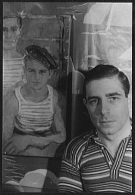 Black and white photograph of artist Maurice Grosser in a striped shirt with a painting behind him.