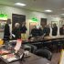 Photograph of people looking at books and artifacts about Chinese food and culture. Taken at the Art Crawl in Special Collections, Melville Library, Stony Brook University on April 26, 2023.