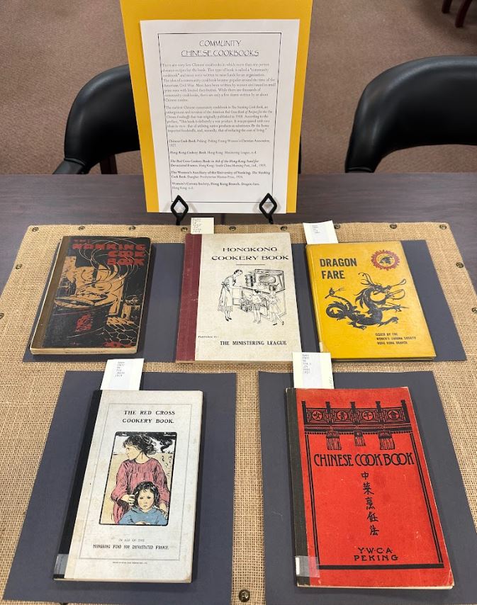 Photograph of five books about Chinese food and culture. Taken at the Art Crawl in Special Collections, Melville Library, Stony Brook University on April 26, 2023.