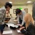 Students in Professor Sam Dodd's course ARH 400 consulting the Robert M. Emery Long Island Rail Road Collection in Special Collections, Stony Brook University Libraries, October 2025.