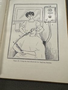 Illustration of a woman applying an electricity node to another woman's face.