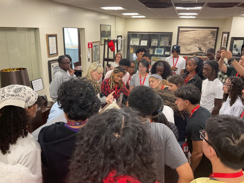 Students enrolled in AIM 100 visit Special Collections with Director Kristen Nyitray on July 9, 2026.